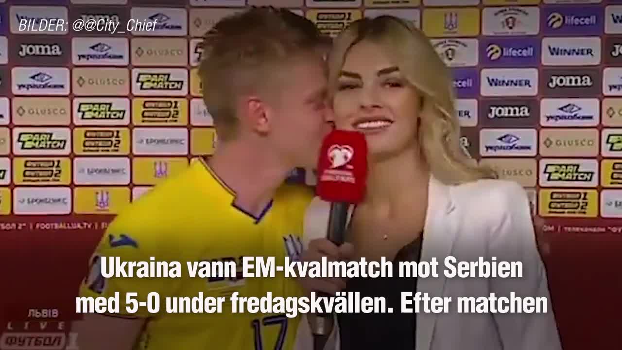 Här pussar Manchester City-spelaren reportern i live-tv