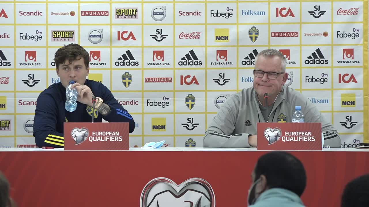 Se landslaget träna i regnet