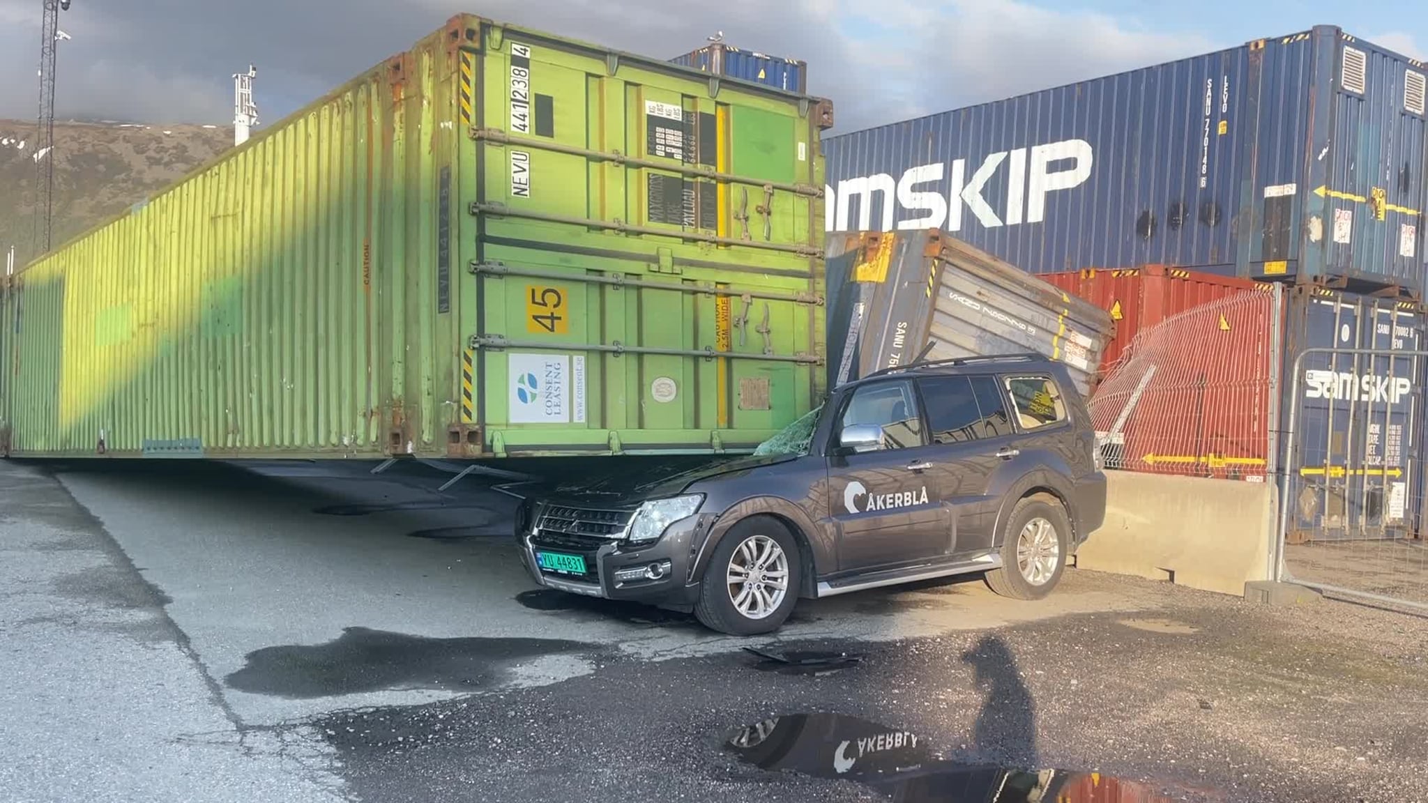 Flying Containers Damage Cars at Sortland Harbor During Storm