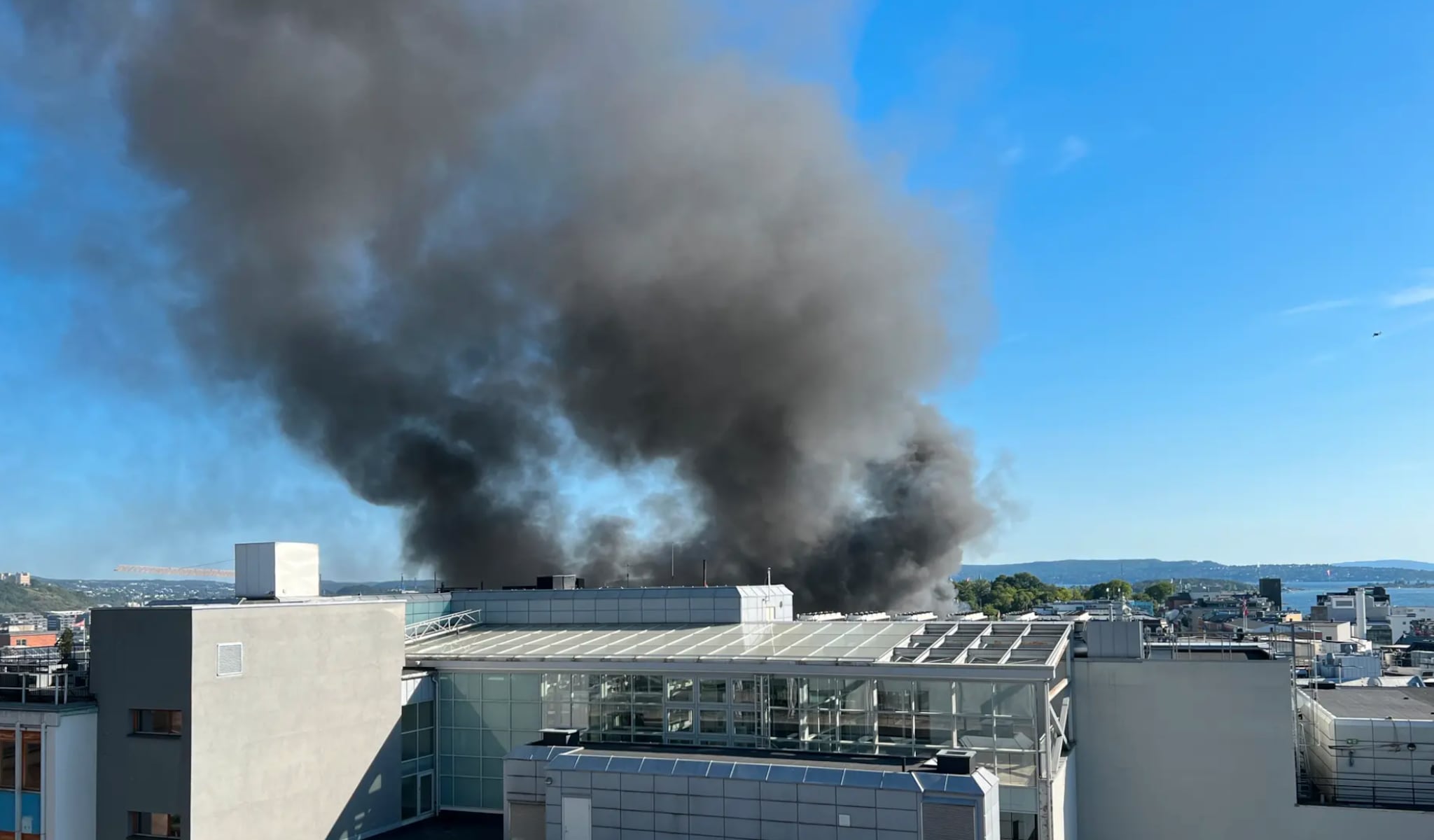 Massive Fire Breaks Out in Central Oslo Building: Emergency Services Work to Evacuate Residents and Control Flames